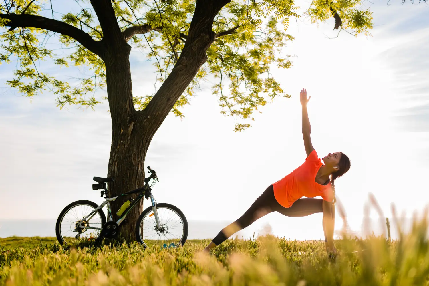 slim-beautiful-woman-silhouette-doing-sports-morning-park-doing-yoga